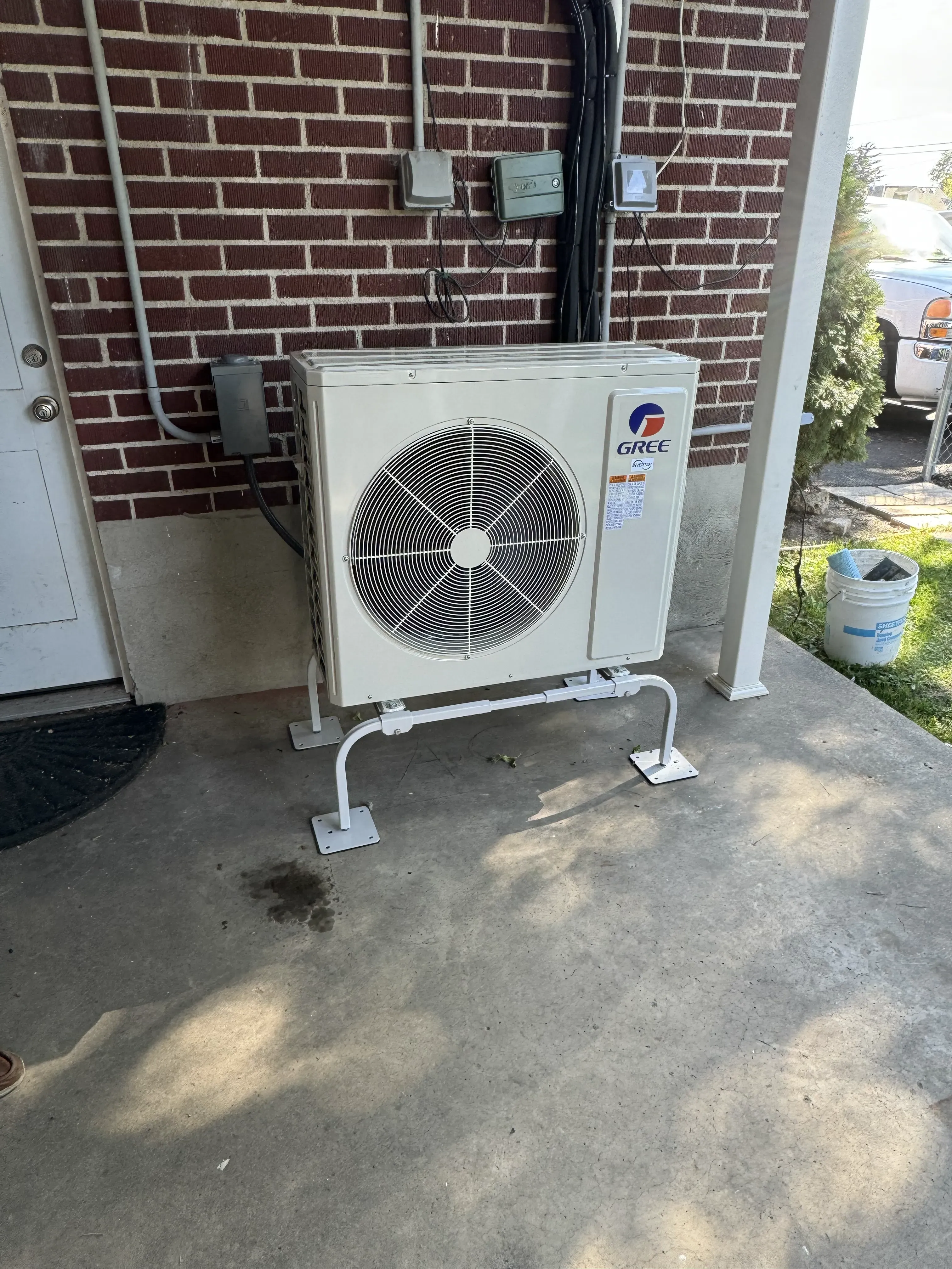 Mini split outdoor unit installed on a patio