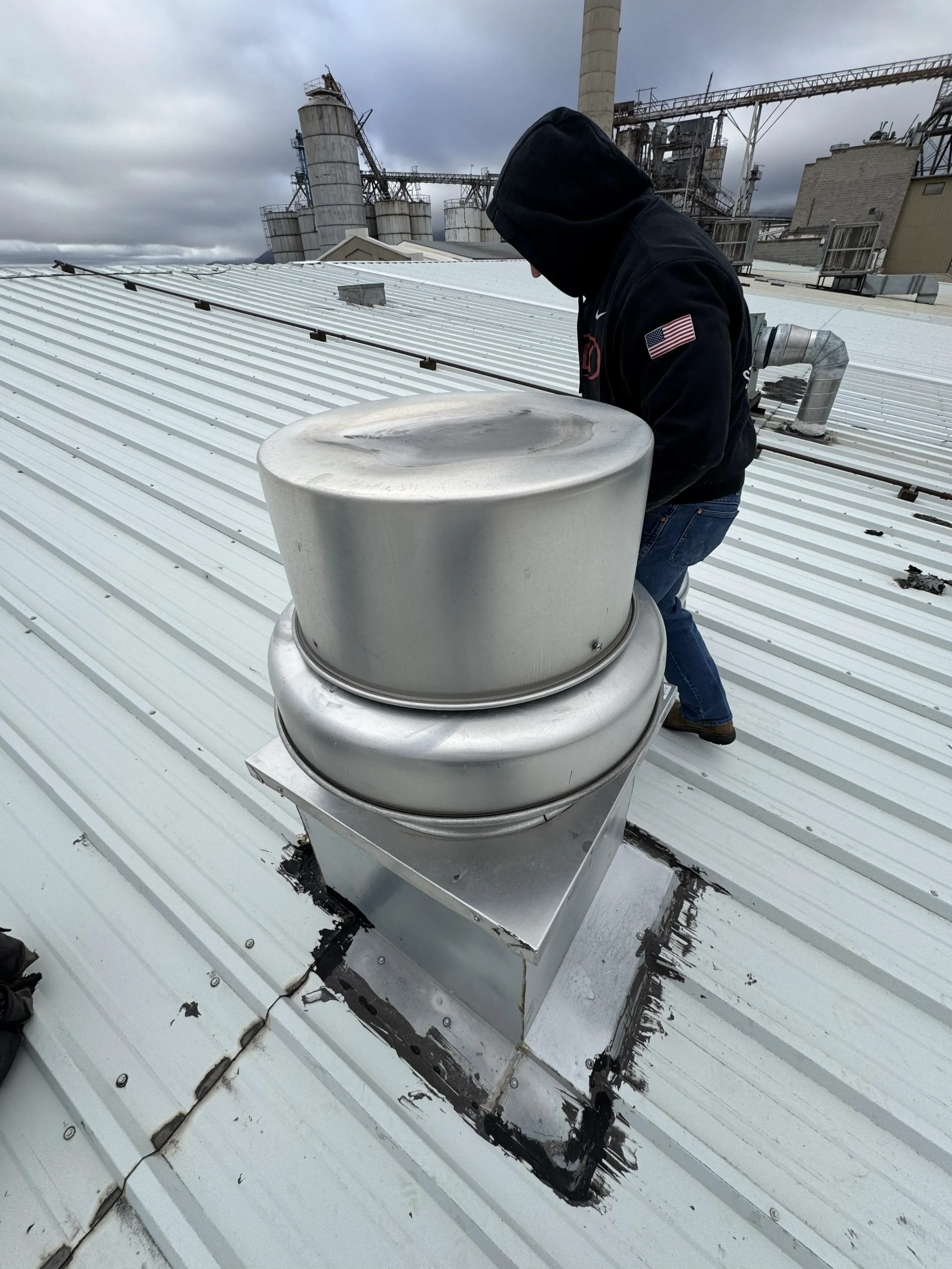 Rooftop upblast exhaust fan service work
